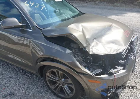 2015 Audi Q3 2.0T Prestige from USA, damaged, VIN WA1FFCFSXFR006437